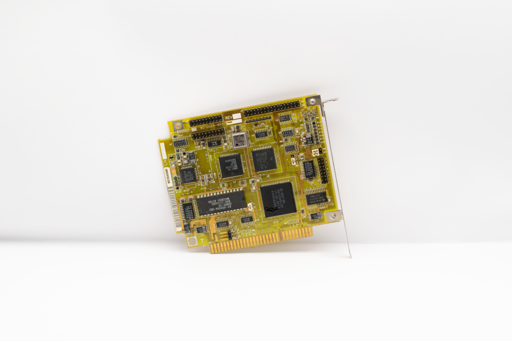 Antique circuit board showcasing vintage computing technology, isolated on a white background. — Best Benefits of Buying Wate