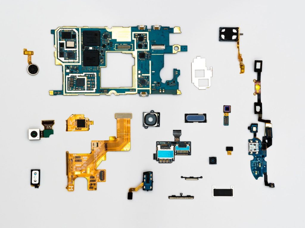 Exploded view of smartphone components showcasing intricate technological design. — Clickfunnels software plans and the diffe