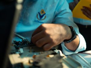 A detailed close-up of a technician working on machinery, highlighting skill and precision. — Enhanced Brand Control with Whi