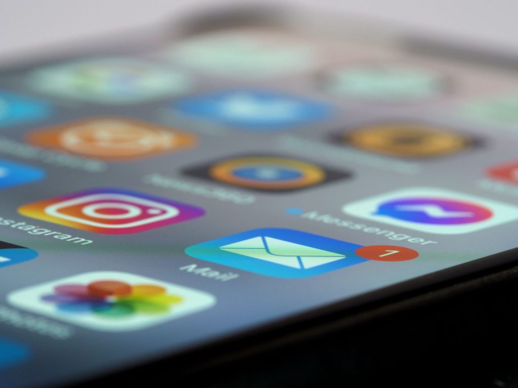 Detailed close-up of smartphone screen displaying various app icons and notifications. — View Pump Website: Enhance content e
