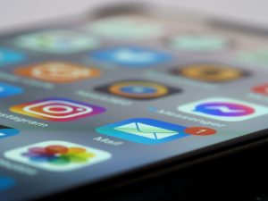 Detailed close-up of smartphone screen displaying various app icons and notifications. — View Pump Website: Enhance content e