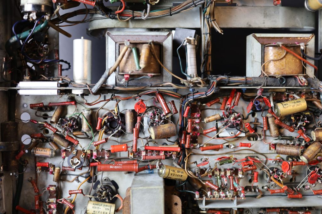 Detailed view of a retro electronics board with wires and components. — What do you mean by smart farming?