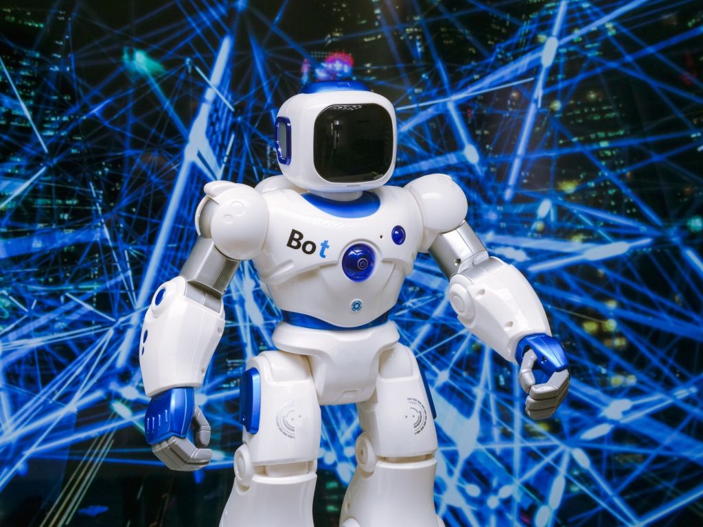 Advanced humanoid robot with glowing blue accents in a digital network setting. — What Is Exceptional and Remarking About Top