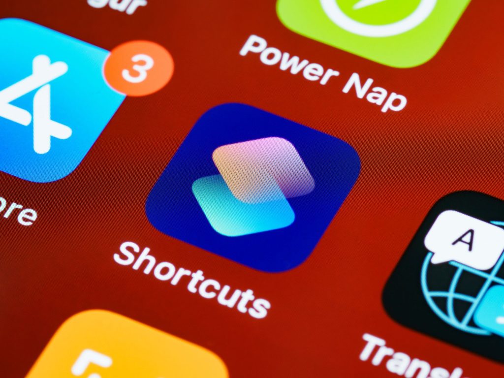 Detailed close-up of smartphone home screen displaying app icons like Shortcuts and Power Nap. — Why Mobile Application Devel